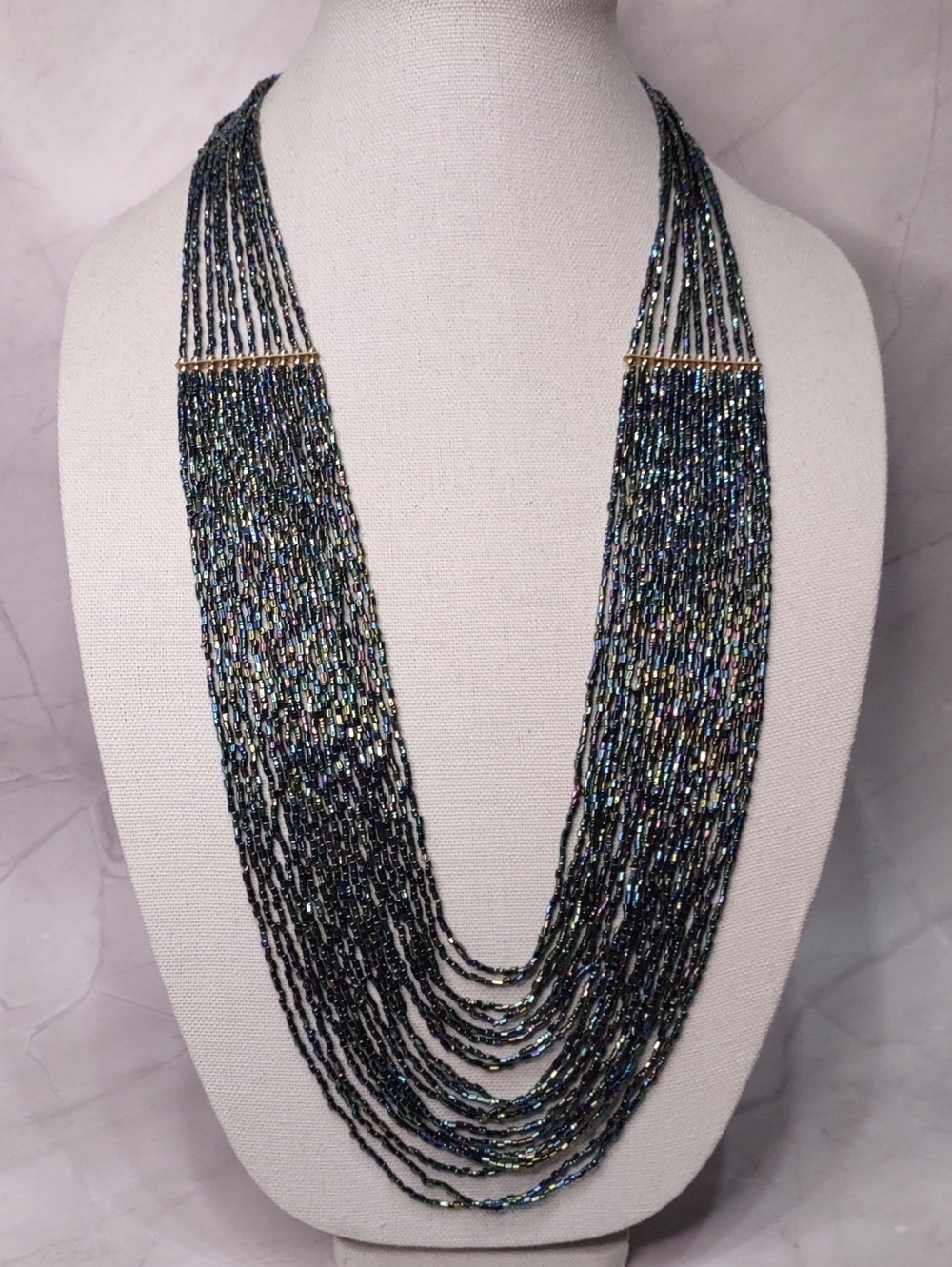 Multi-Strand Iridescent Black Beaded Necklace with Gold Accents